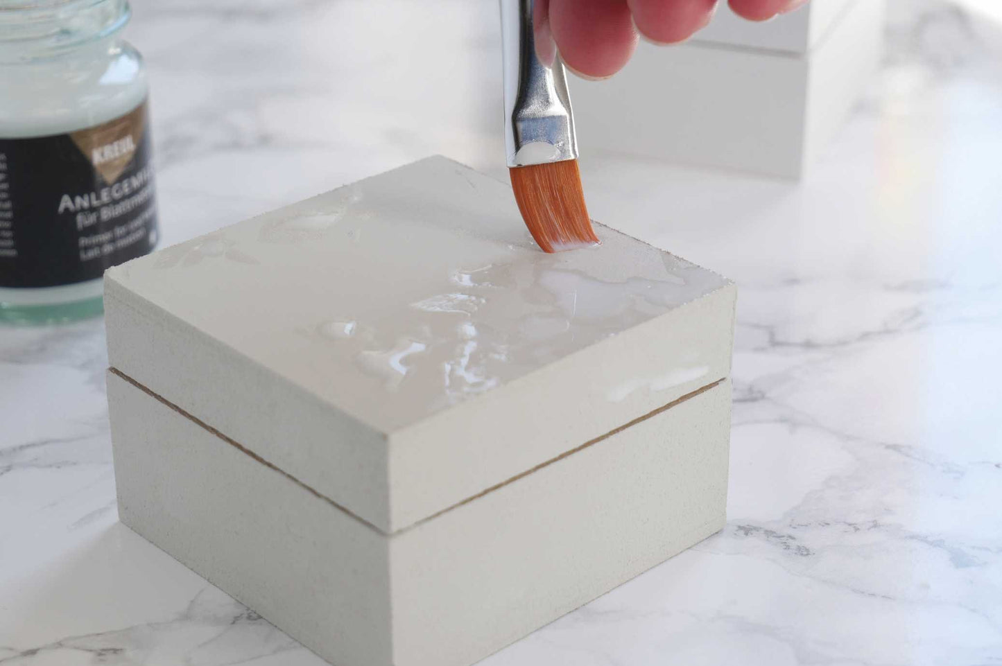 Erklärung zur Anwendung von Anlegemilch für Blattmetall